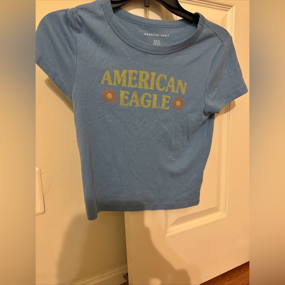American Eagle light blue baby tee with logo women’s size M